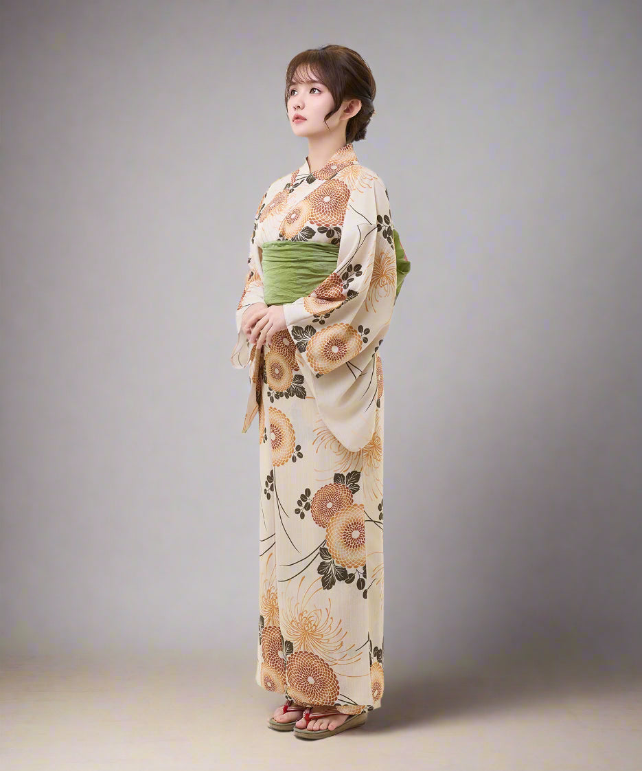 Woman wearing a floral kimono on a white background
